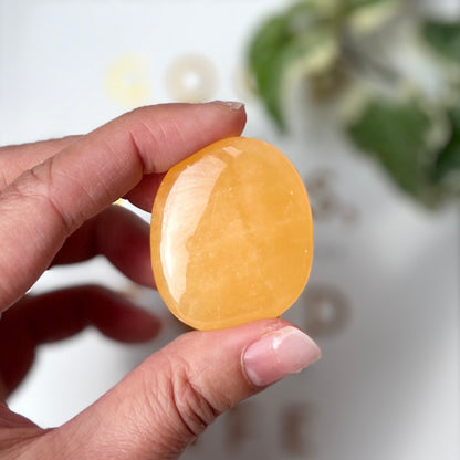 Orange Calcite Palm stone