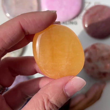 Orange Calcite Palm stone